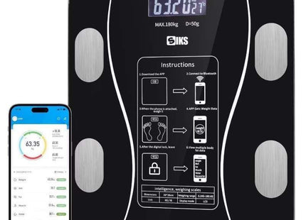 Μαύρη ζυγαριά SIKS 180kg δίπλα σε κινητό με εφαρμογή μέτρησης