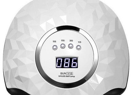 Λευκό φουρνάκι νυχιών Sun Y13 UV LED 248W με γεωμετρική επιφάνεια, ψηφιακή οθόνη και πλήκτρα 10, 30, 60 και 99 δευτερολέπτων.